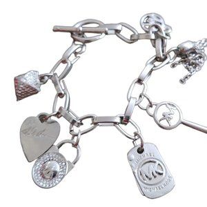 Michael Kors Jewelry Charm Bracelet is a stylish and elegant accessory  bracelet